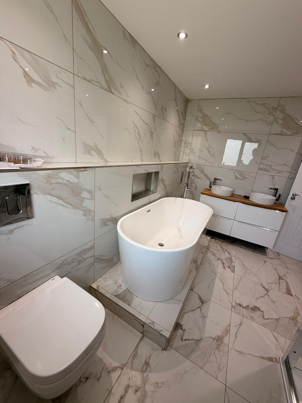 Marble bathroom with a twin basin vanity unit